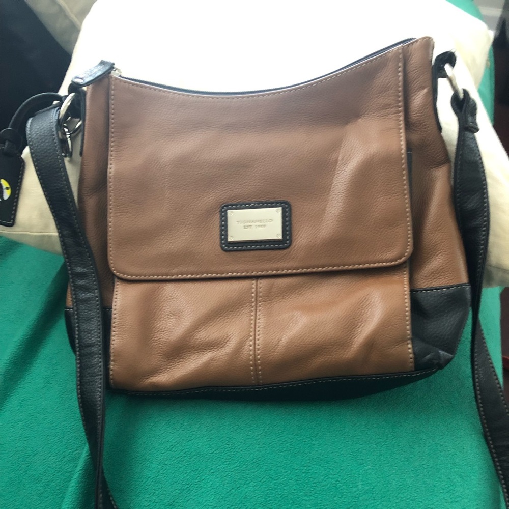 Camel with brown bag